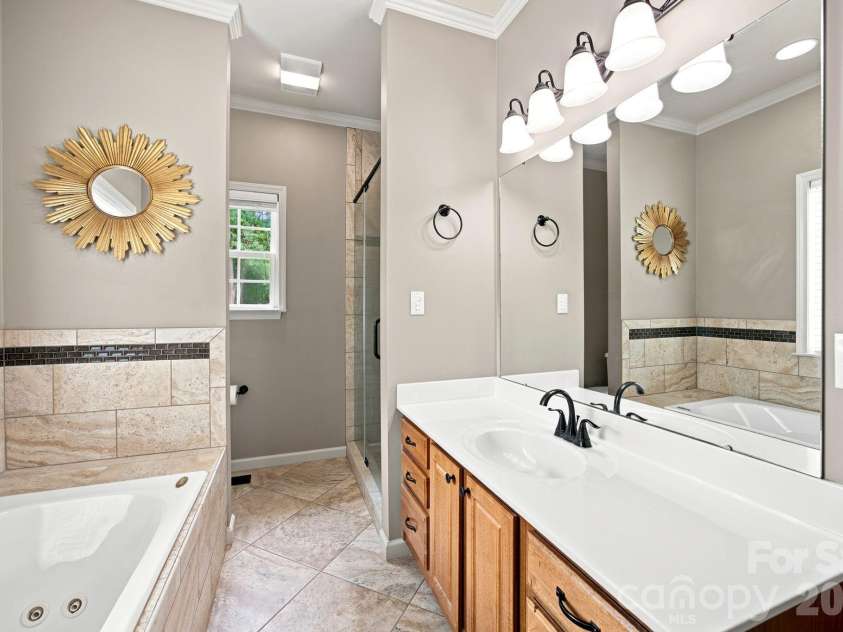 7073 Ridgeway Road, Stanley, NC 28164.  MLS# CAR4406988, YatesRealty ID 39719. Primary bath