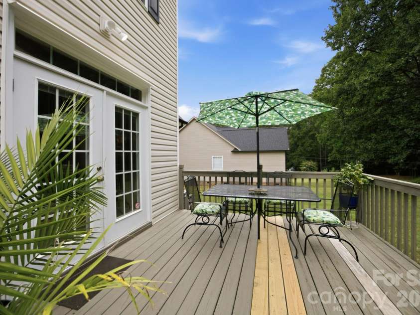 7073 Ridgeway Road, Stanley, NC 28164.  MLS# CAR4406988, YatesRealty ID 39719. Rear deck overlooking the amazing yard!