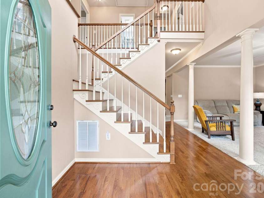 7073 Ridgeway Road, Stanley, NC 28164.  MLS# CAR4406988, YatesRealty ID 39719. Two story foyer with open railing on the staircase