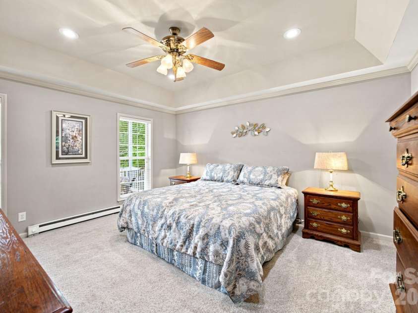 7073 Ridgeway Road, Stanley, NC 28164.  MLS# CAR4406988, YatesRealty ID 39719. Windows overlook the rocking chair front porch