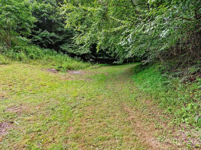 530 Rebel Ridge Road, Marshall, NC 28753.  MLS# CAR4280737, YatesRealty ID 3972. Enchanting flat backyard