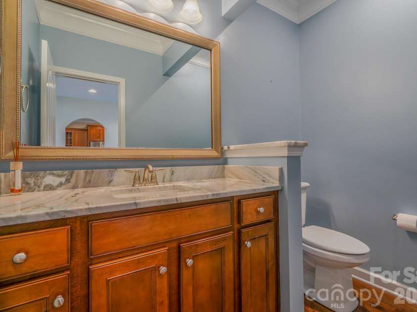 9416 Segundo Lane, Charlotte, NC 28278.  MLS# CAR4355227, YatesRealty ID 3972. Main level half bath 