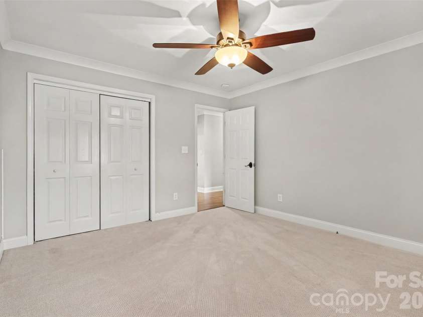 21334 Sandy Cove Road, Cornelius, NC 28031.  MLS# CAR4432182, YatesRealty ID 39729. Secondary bedroom