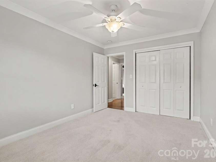 21334 Sandy Cove Road, Cornelius, NC 28031.  MLS# CAR4432182, YatesRealty ID 39729. Secondary bedroom
