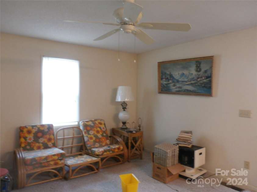 288 Firetower Road, Spruce Pine, NC 28777.  MLS# CAR4135750, YatesRealty ID 3973. Apartment living room