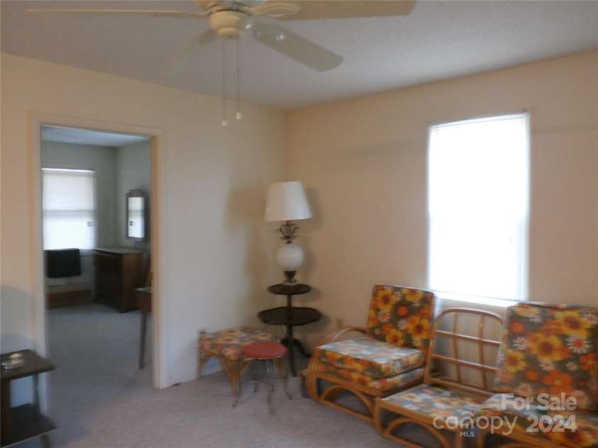 288 Firetower Road, Spruce Pine, NC 28777.  MLS# CAR4135750, YatesRealty ID 3973. Apartment living room