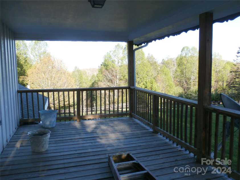 288 Firetower Road, Spruce Pine, NC 28777.  MLS# CAR4135750, YatesRealty ID 3973. Upstairs deck