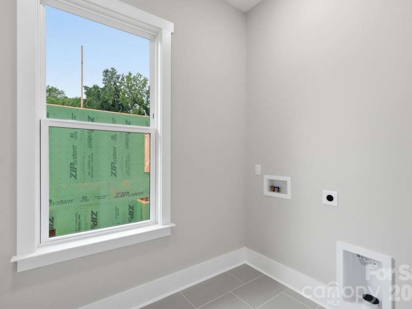 1106 Brookhurst Drive, Charlotte, NC 28205.  MLS# CAR4399535, YatesRealty ID 39732. Laundry