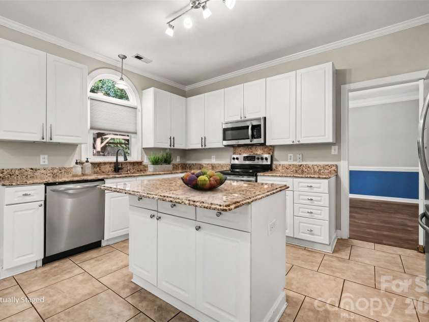 4112 Deerfield Drive, Concord, NC 28027.  MLS# CAR4406358, YatesRealty ID 39741. 