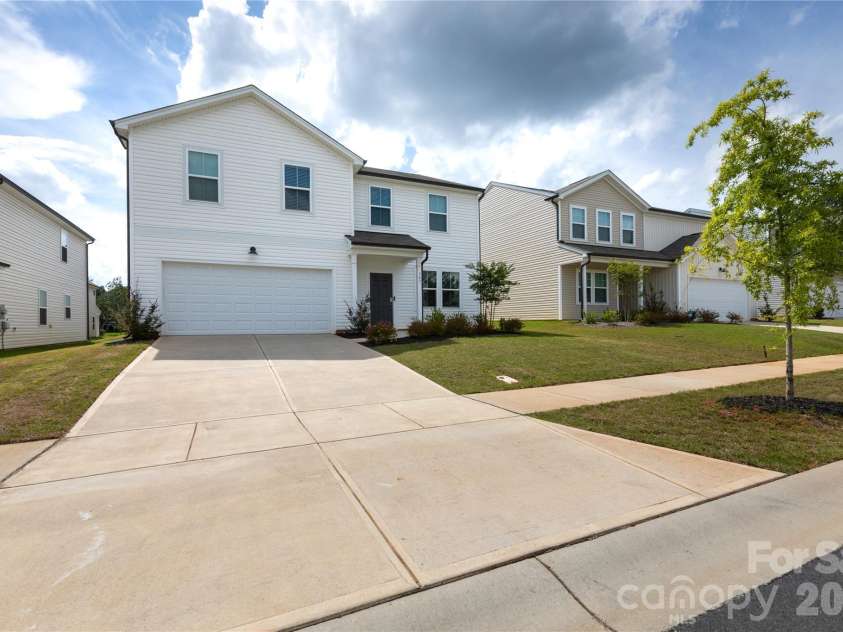 507 Good Hope Road, Concord, NC 28025.  MLS# CAR4407350, YatesRealty ID 39745. Exterior Front with large driveway