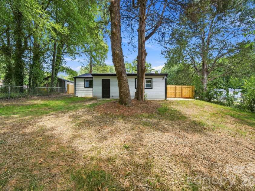 8114 Holly Hill Road, Charlotte, NC 28227.  MLS# CAR4407427, YatesRealty ID 39748. Backyard