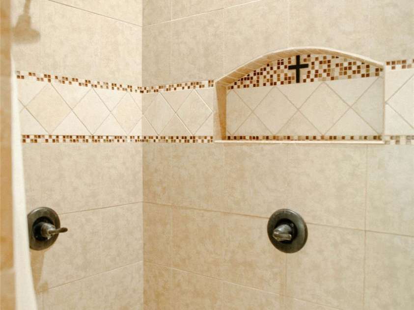 4642 King Crowder Drive, Gastonia, NC 28052.  MLS# CAR4147869, YatesRealty ID 3975. Custom tile walk in shower with multiple heads and seating bench