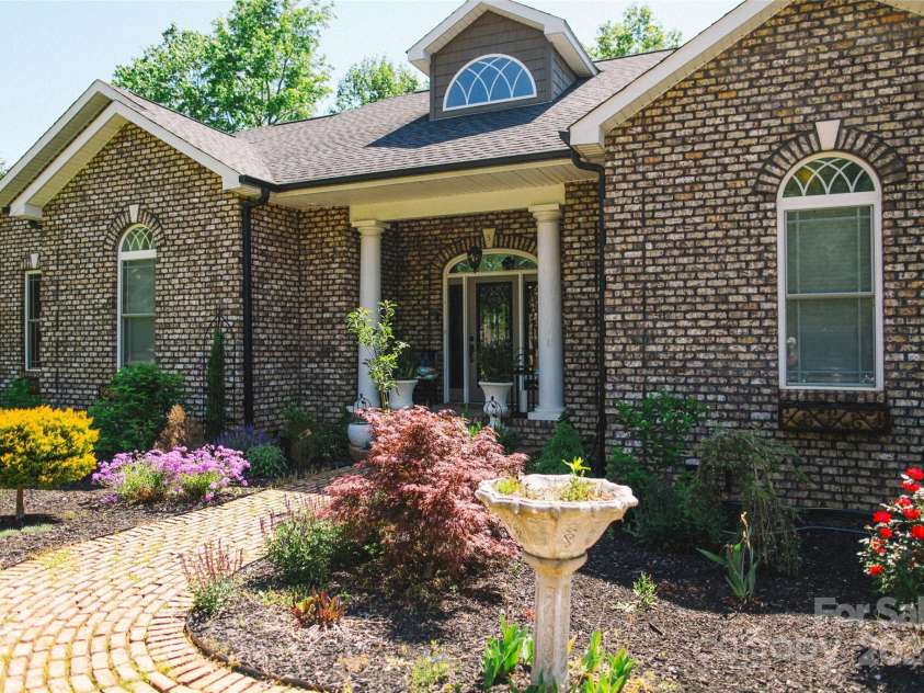 4642 King Crowder Drive, Gastonia, NC 28052.  MLS# CAR4147869, YatesRealty ID 3975. Front walk and entrance