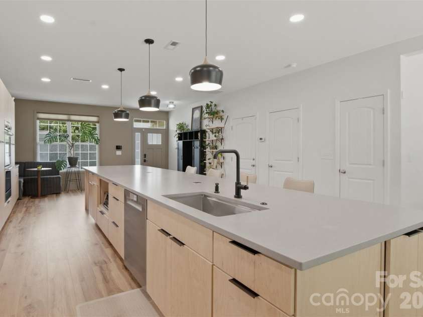 2002 Canopy Drive, Indian Trail, NC 28079.  MLS# CAR4406703, YatesRealty ID 39757. 16 ft Kitchen Island