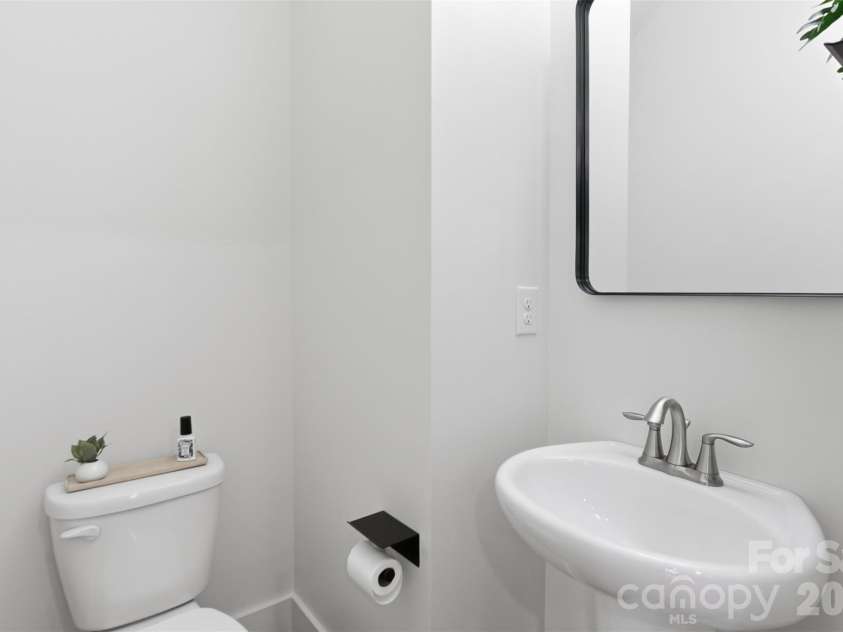 2002 Canopy Drive, Indian Trail, NC 28079.  MLS# CAR4406703, YatesRealty ID 39757. Half Bath on Main Floor
