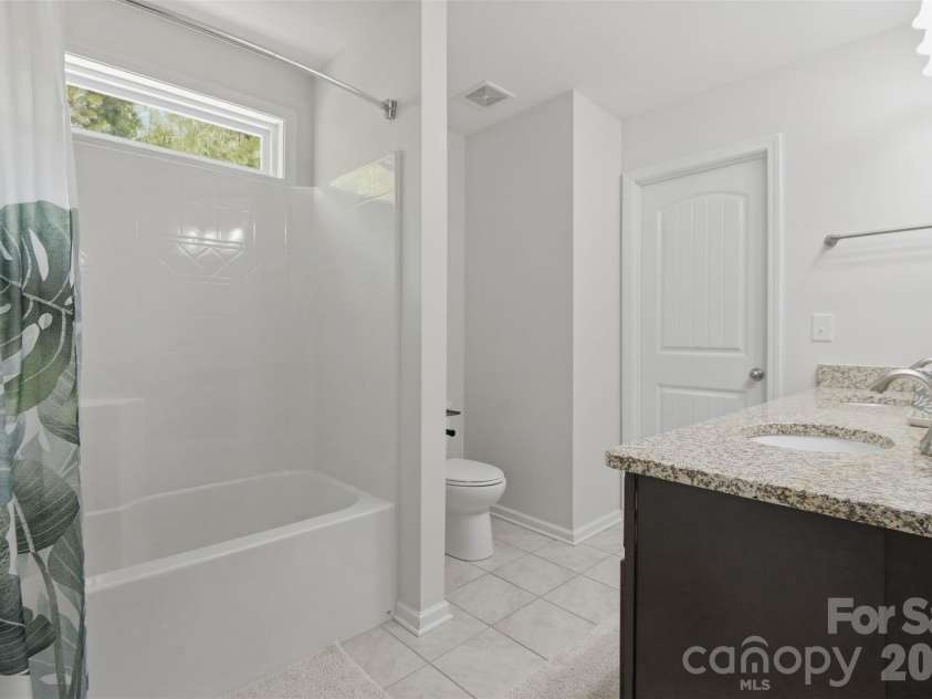 2002 Canopy Drive, Indian Trail, NC 28079.  MLS# CAR4406703, YatesRealty ID 39757. Jack and Jill bathroom