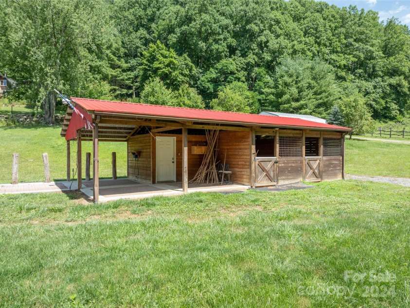 1499 Turkey Creek Road, Clyde, NC 28721.  MLS# CAR4160195, YatesRealty ID 3976. View of 4 Stall Barn