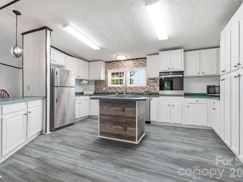 3307 Baltimore Road, East Bend, NC 27018.  MLS# CAR4406336, YatesRealty ID 39767. Kitchen