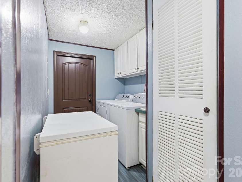 3307 Baltimore Road, East Bend, NC 27018.  MLS# CAR4406336, YatesRealty ID 39767. Laundry Room/ Mud Room