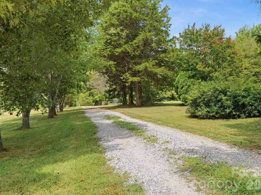 3307 Baltimore Road, East Bend, NC 27018.  MLS# CAR4406336, YatesRealty ID 39767. Long Private Driveway off the main road