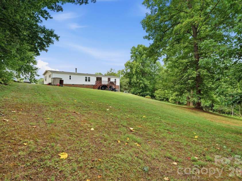 3307 Baltimore Road, East Bend, NC 27018.  MLS# CAR4406336, YatesRealty ID 39767. Spacious Backyard with year round views!!