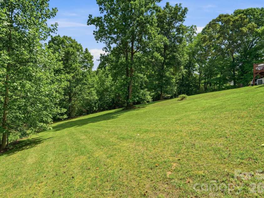 3307 Baltimore Road, East Bend, NC 27018.  MLS# CAR4406336, YatesRealty ID 39767. Spacious Backyard with year round views!!