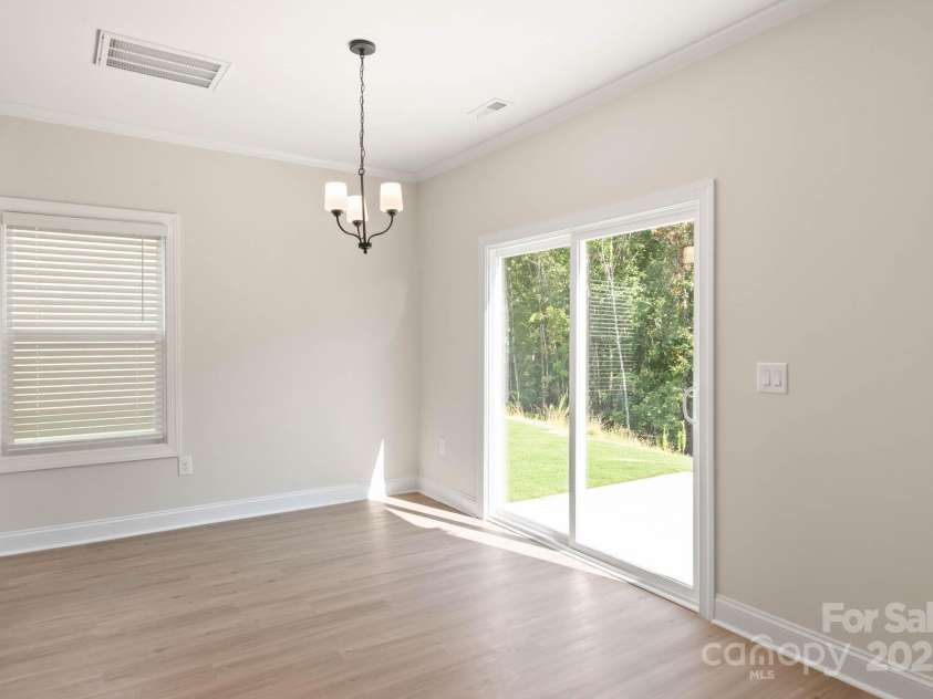 109 Rills Crossing Way, Troutman, NC 28166.  MLS# CAR4277660, YatesRealty ID 3977. Dining room