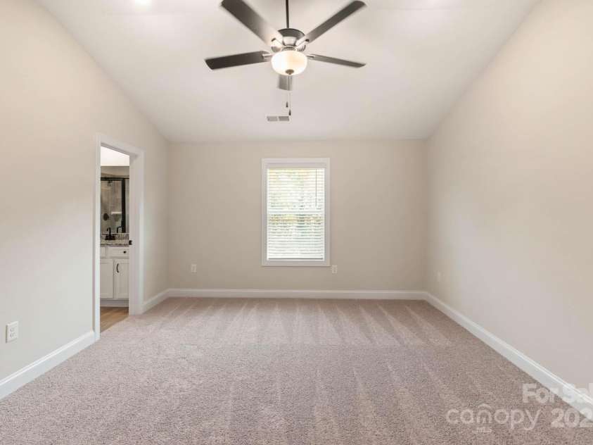 109 Rills Crossing Way, Troutman, NC 28166.  MLS# CAR4277660, YatesRealty ID 3977. Master bedroom