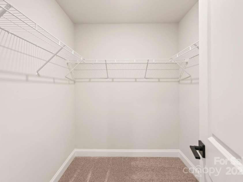 109 Rills Crossing Way, Troutman, NC 28166.  MLS# CAR4277660, YatesRealty ID 3977. Master closet