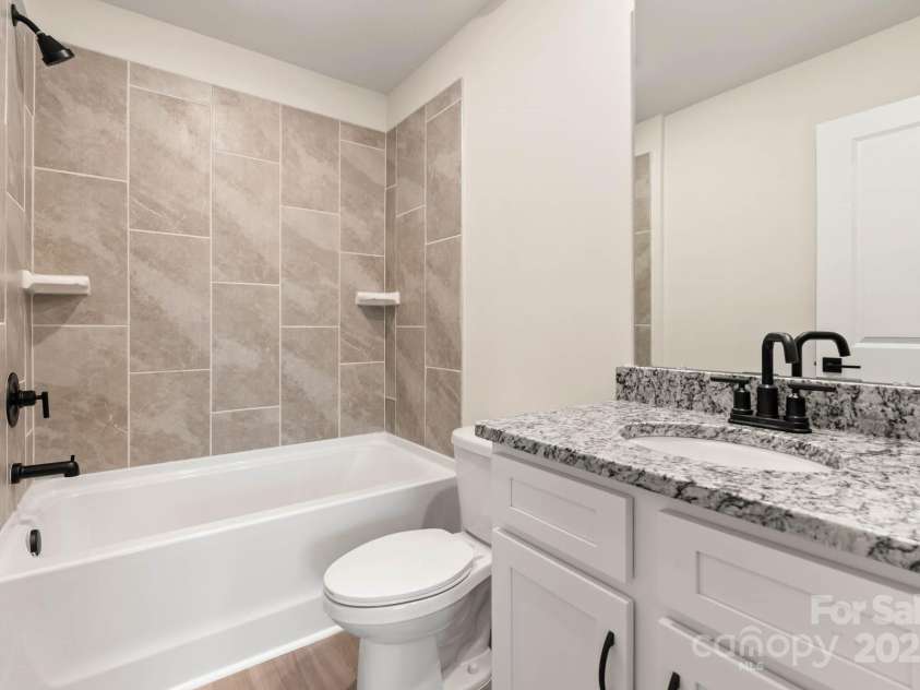 109 Rills Crossing Way, Troutman, NC 28166.  MLS# CAR4277660, YatesRealty ID 3977. Secondary bathroom