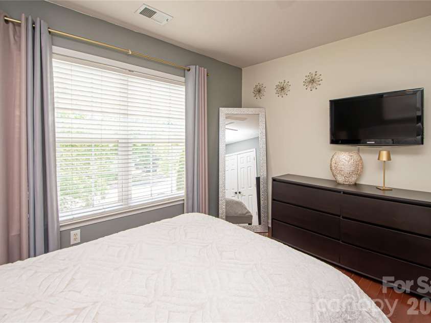 14114 Eldon Drive, Charlotte, NC 28277.  MLS# CAR4406225, YatesRealty ID 39773. Bedroom # 2 has engineer wood floor, closet, and ceiling fan