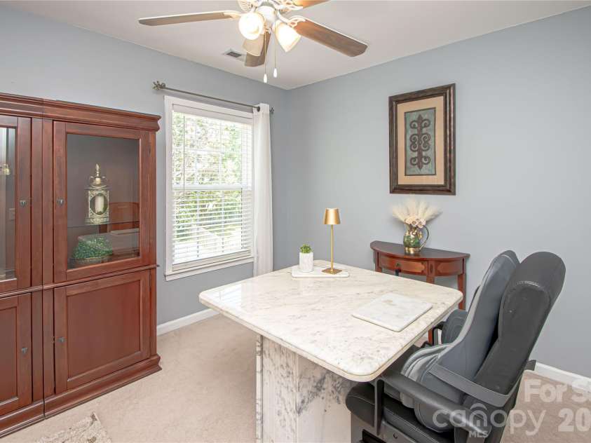 14114 Eldon Drive, Charlotte, NC 28277.  MLS# CAR4406225, YatesRealty ID 39773. Bedroom # 3 is currently being used as an office.  It has a closet and ceiling fan.