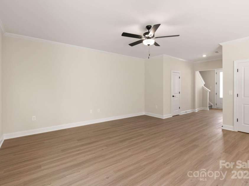 121 Rills Crossing Way, Troutman, NC 28166.  MLS# CAR4277662, YatesRealty ID 3978. Front entry into family room