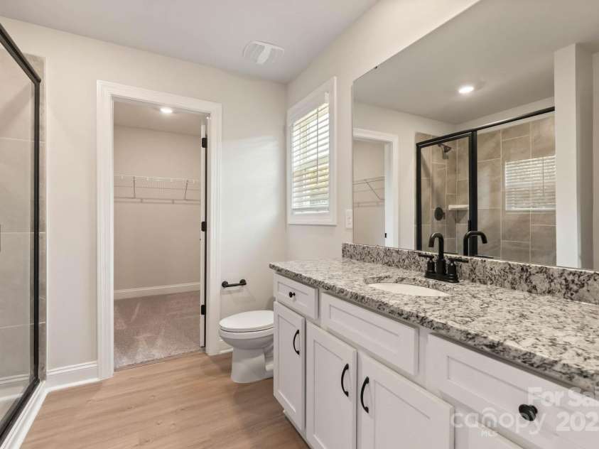 121 Rills Crossing Way, Troutman, NC 28166.  MLS# CAR4277662, YatesRealty ID 3978. Master bathroom