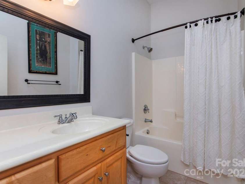 4709 Trey View Court, Mint Hill, NC 28227.  MLS# CAR4173427, YatesRealty ID 3978. Basement Full Bath - this basement has everything but the kitchen sink - maybe could add in room by exterior entrance!