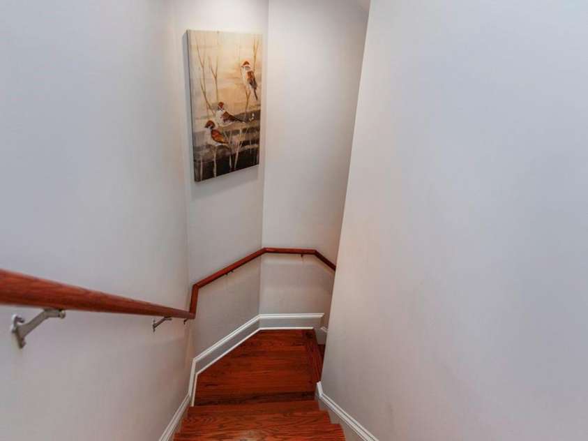 4709 Trey View Court, Mint Hill, NC 28227.  MLS# CAR4173427, YatesRealty ID 3978. Finished basement is entered on interior by these HW stairs.  From outside, double French doors on concrete patio open to office/or could be future kitchen!!