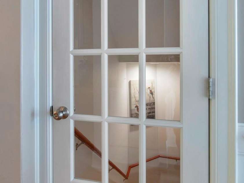 4709 Trey View Court, Mint Hill, NC 28227.  MLS# CAR4173427, YatesRealty ID 3978. French door opens to HW stairs to basement