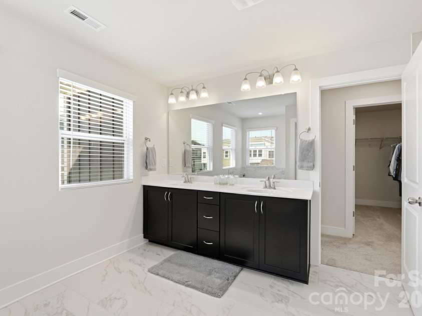 2745 Ensemble Court, Charlotte, NC 28262.  MLS# CAR4405842, YatesRealty ID 39785. Double sinks, good drawer space