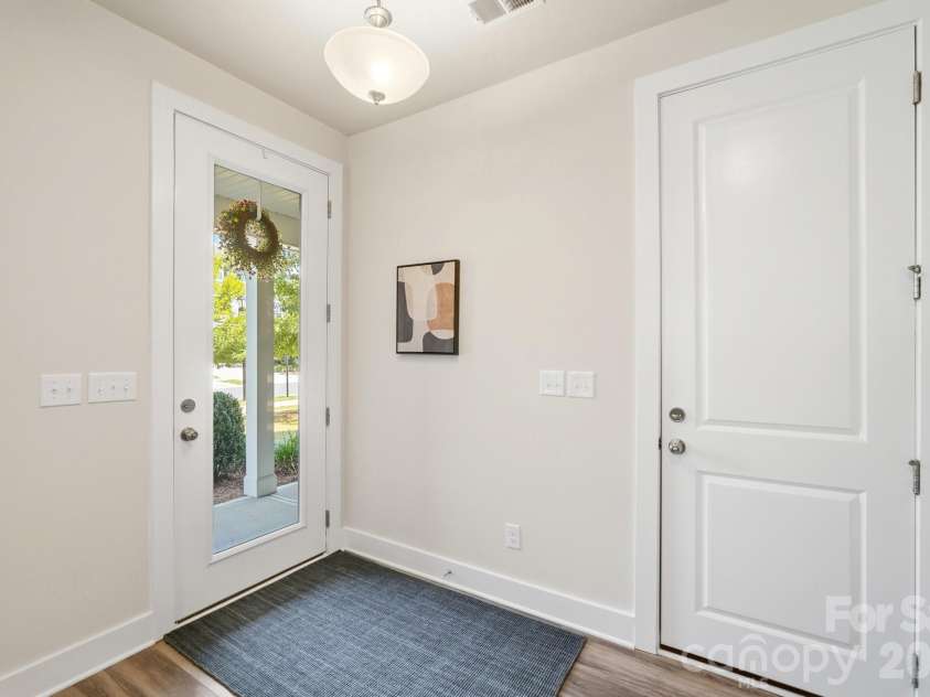 2745 Ensemble Court, Charlotte, NC 28262.  MLS# CAR4405842, YatesRealty ID 39785. Foyer/Drop Zone area