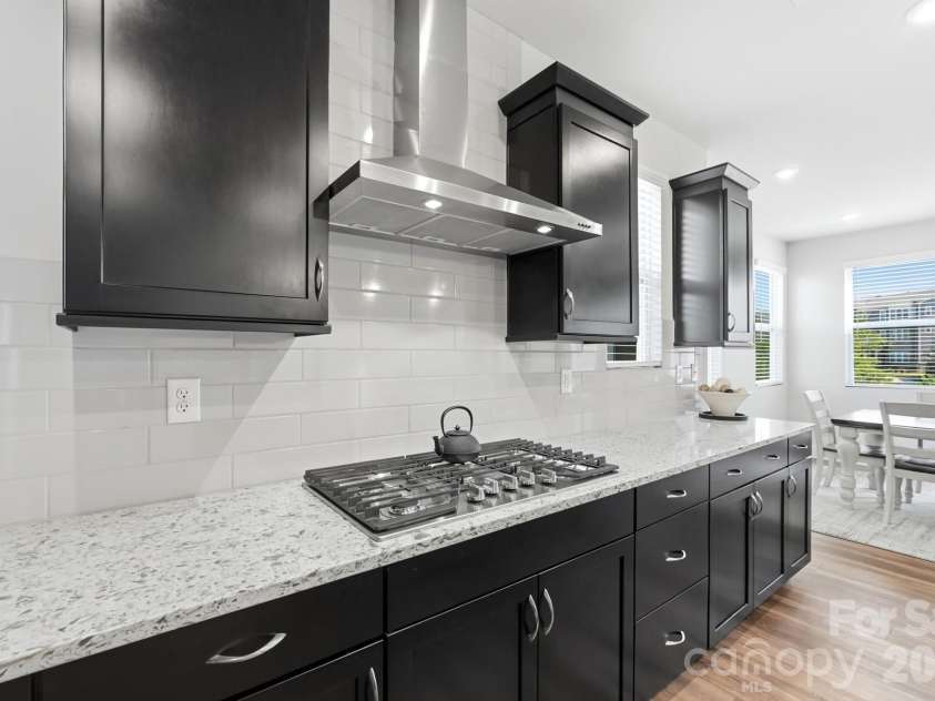 2745 Ensemble Court, Charlotte, NC 28262.  MLS# CAR4405842, YatesRealty ID 39785. Gas cooktop & vented exhaust