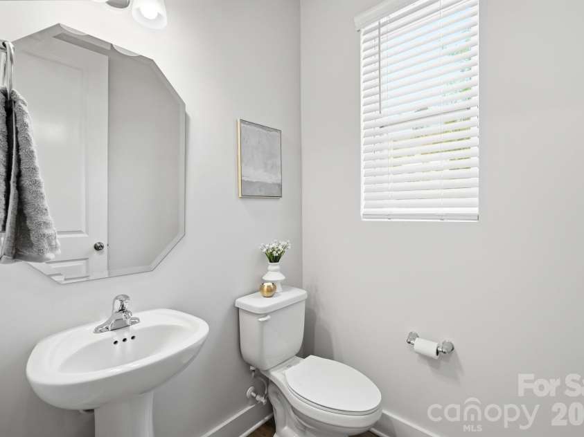 2745 Ensemble Court, Charlotte, NC 28262.  MLS# CAR4405842, YatesRealty ID 39785. Main Level Half Bath