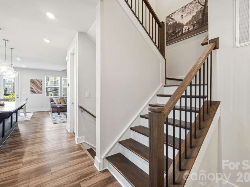 2745 Ensemble Court, Charlotte, NC 28262.  MLS# CAR4405842, YatesRealty ID 39785. Modern staircase