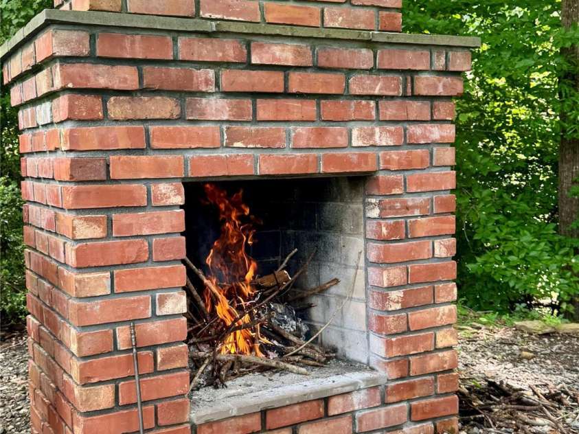 267 25th Avenue, Hickory, NC 28601.  MLS# CAR4405765, YatesRealty ID 39790. Side yard fireplace