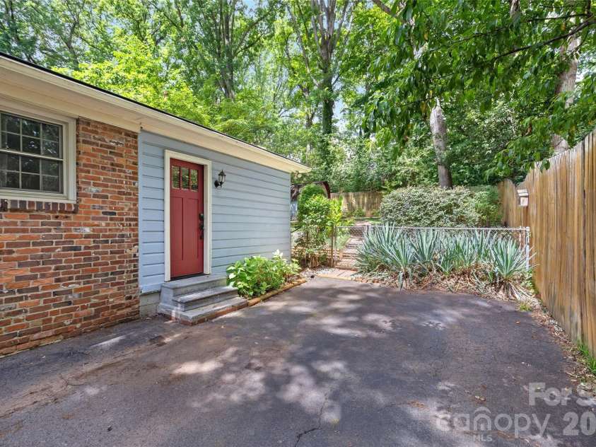 6326 Rosecrest Drive, Charlotte, NC 28210.  MLS# CAR4405630, YatesRealty ID 39794. Driveway with side entrance