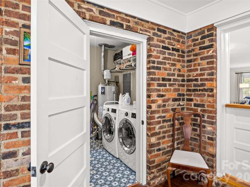 6326 Rosecrest Drive, Charlotte, NC 28210.  MLS# CAR4405630, YatesRealty ID 39794. Laundry Room with storage