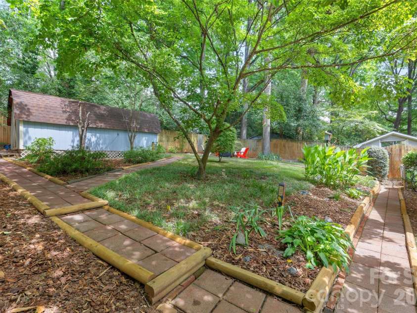 6326 Rosecrest Drive, Charlotte, NC 28210.  MLS# CAR4405630, YatesRealty ID 39794. Tiered Backyard for planting flowers or herbs