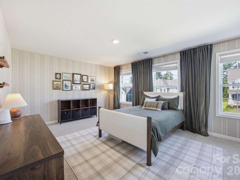 5821 Casper Drive, Charlotte, NC 28214.  MLS# CAR4405553, YatesRealty ID 39797. Bedroom #2 on the upper level.