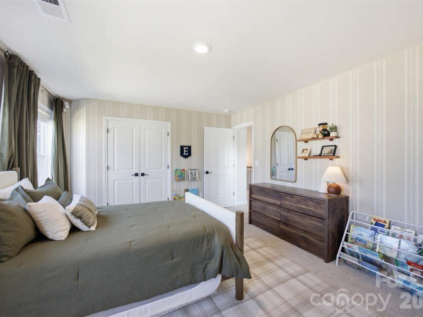 5821 Casper Drive, Charlotte, NC 28214.  MLS# CAR4405553, YatesRealty ID 39797. Bedroom #2 on the upper level.
