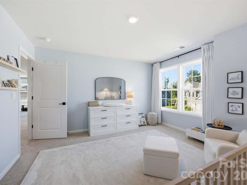 5821 Casper Drive, Charlotte, NC 28214.  MLS# CAR4405553, YatesRealty ID 39797. Bedroom #3 on the upper level.