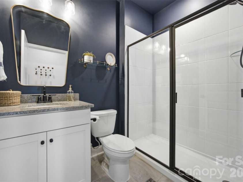 5821 Casper Drive, Charlotte, NC 28214.  MLS# CAR4405553, YatesRealty ID 39797. Full bathroom on the main level.
